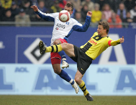 天津津门虎防守稳固（天津津门虎后防稳如磐石）